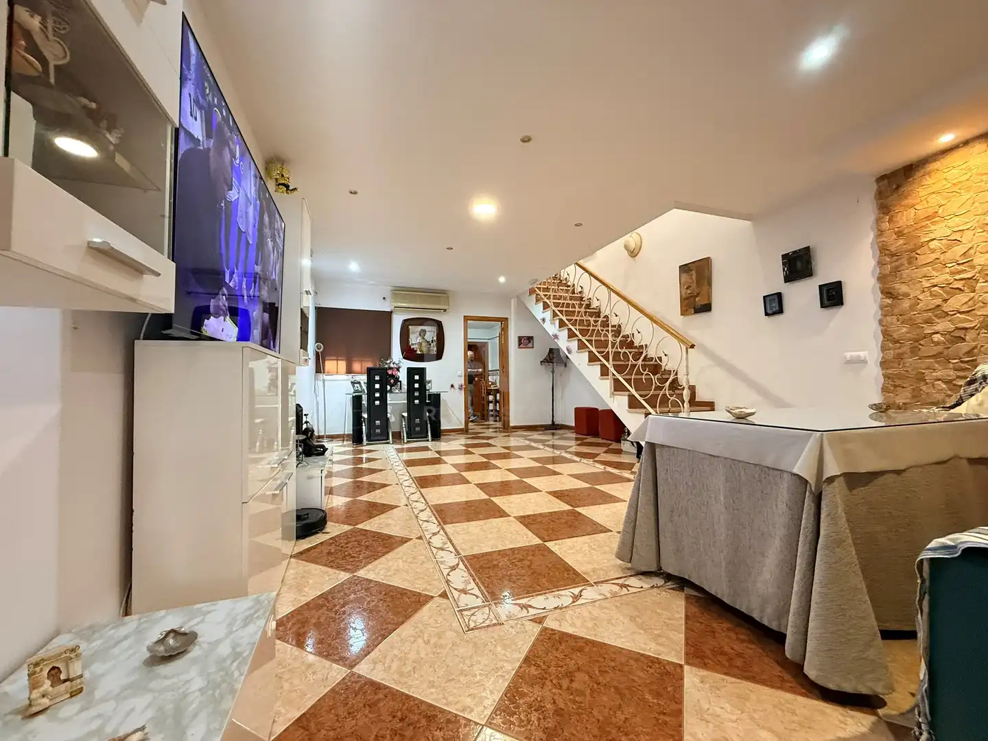 Sala de estar de Casa adosada en venta en Huelva con Aire acondicionado y Calefacción