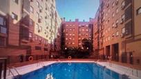 Swimming pool of Flat for sale in  Madrid Capital  with Air Conditioner, Heating and Private garden