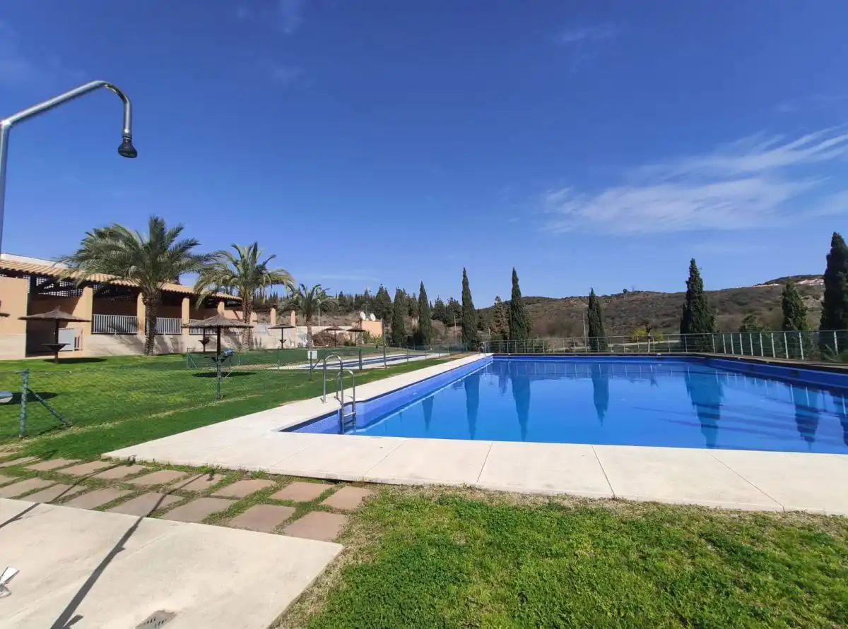 Piscina de Casa adosada en venta en Mijas con Aire acondicionado, Calefacción y Terraza