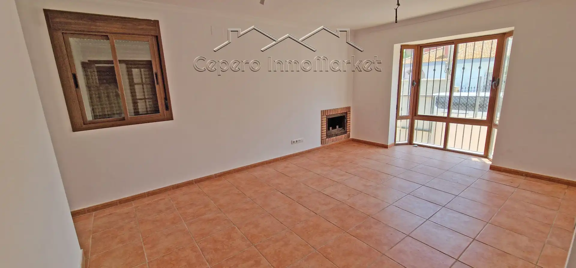 Wohnzimmer von Einfamilien-Reihenhaus zum Verkauf in El Puerto de Santa María mit Privatgarten und Balkon