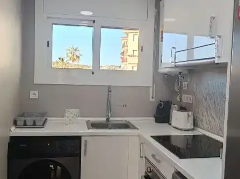 Cuina de Pis de lloguer en Cunit amb Aire condicionat