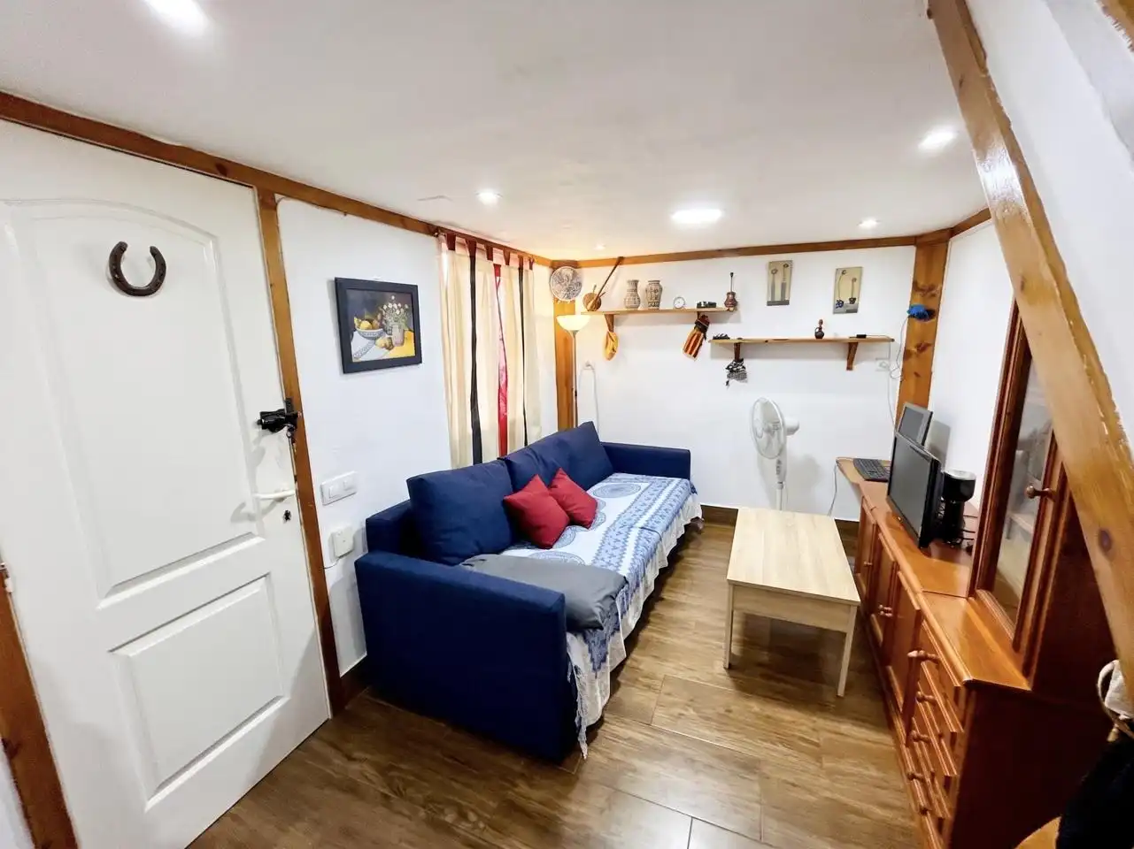 Sala d'estar de Apartament en venda en Valencina de la Concepción amb Aire condicionat, Piscina i Moblat