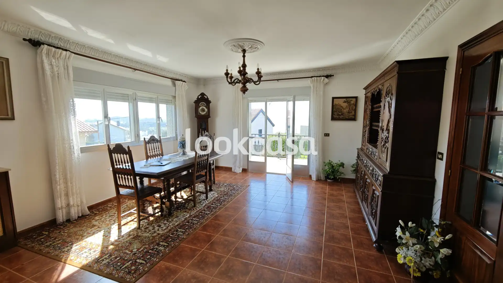 Sala d'estar de Casa o xalet en venda en Sanxenxo amb Calefacció, Jardí privat i Terrassa