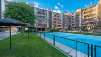 Swimming pool of Flat for sale in  Madrid Capital  with Air Conditioner