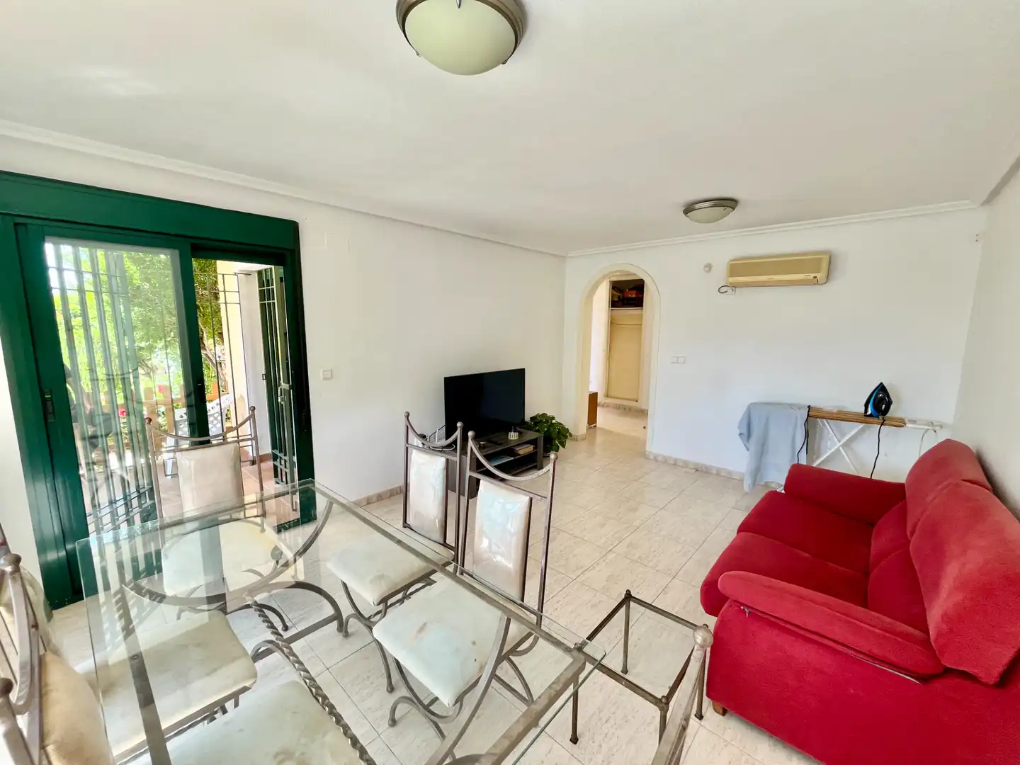 Sala d'estar de Apartament en venda en Orihuela amb Aire condicionat, Jardí privat i Terrassa