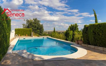 Swimming pool of House or chalet for sale in Almodóvar del Río  with Air Conditioner and Swimming Pool