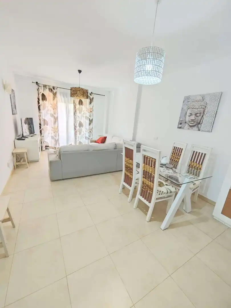 Sala de estar de Planta baja en venta en Vélez-Málaga con Terraza, Piscina y Amueblado