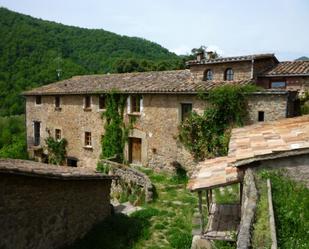Vista exterior de Casa o xalet en venda en La Vall de Bianya amb Calefacció, Terrassa i Piscina