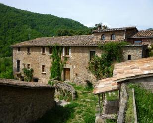 Vista exterior de Casa o xalet en venda en La Vall de Bianya amb Calefacció, Terrassa i Piscina