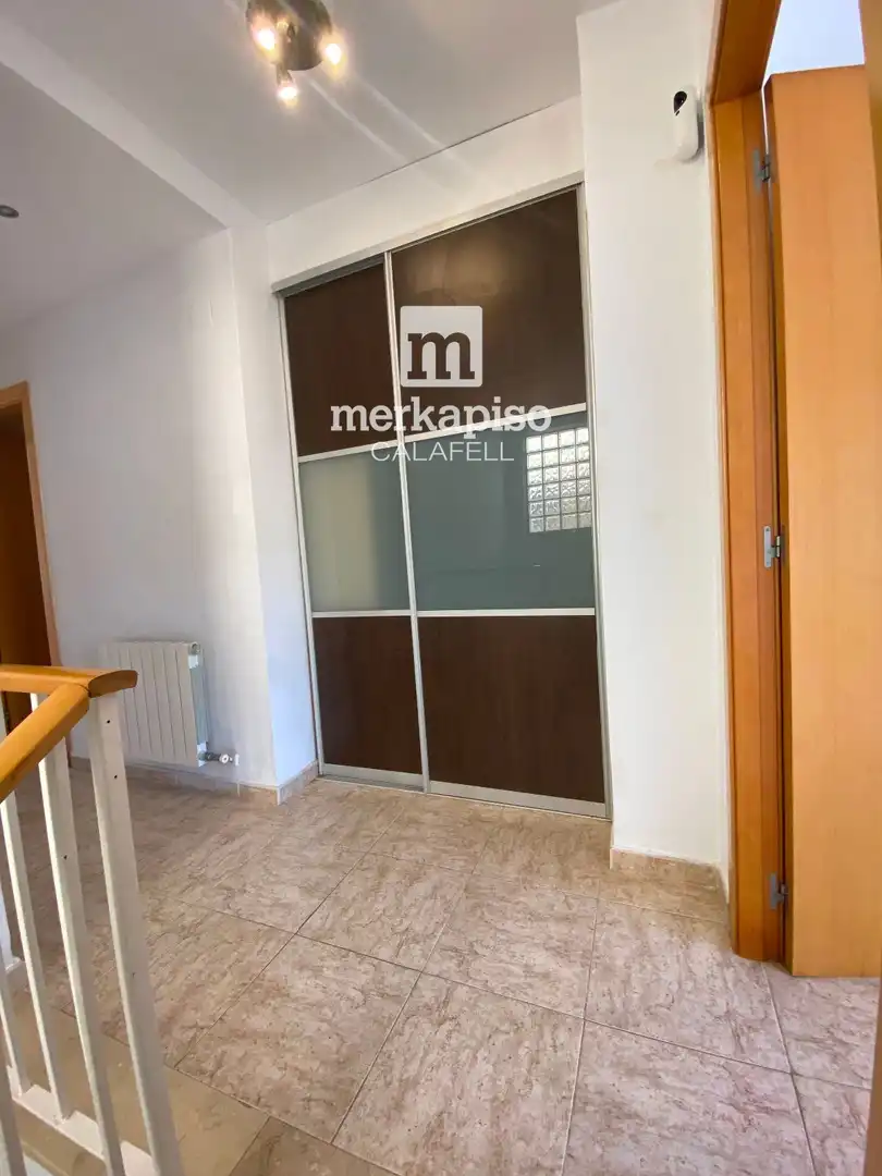 Schlafzimmer von Einfamilien-Reihenhaus zum Verkauf in Calafell mit Heizung