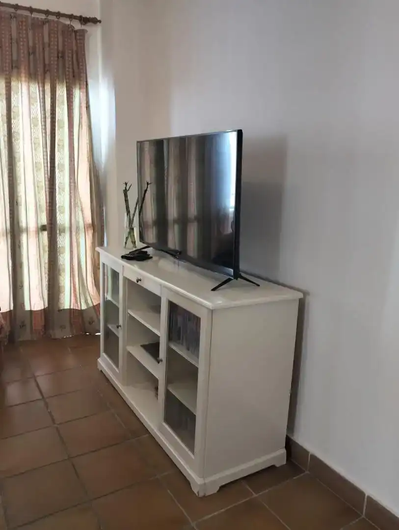 Sala de estar de Piso en venta en Rota con Piscina, Amueblado y Horno
