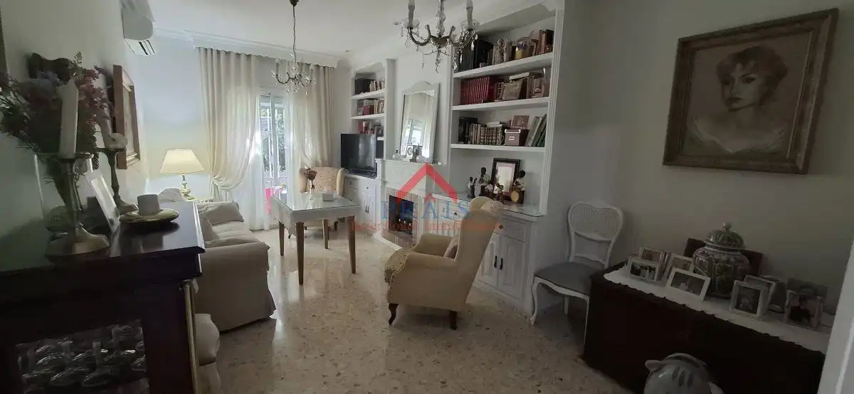 Sala de estar de Casa adosada en venta en Utrera con Aire acondicionado y Trastero