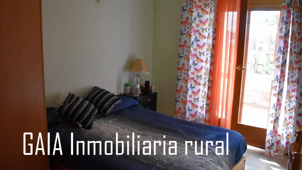 Schlafzimmer von Einfamilien-Reihenhaus zum Verkauf in Caspe
