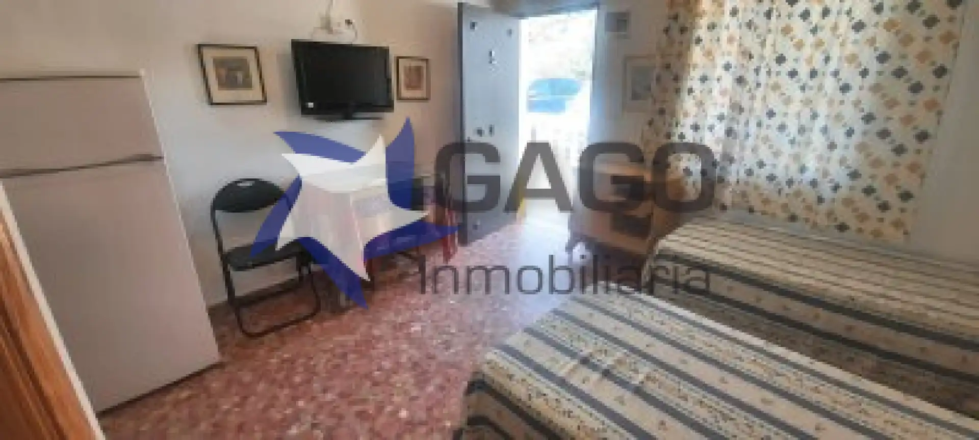 Sala d'estar de Estudi de lloguer en Córdoba amb Aire condicionat i Moblat