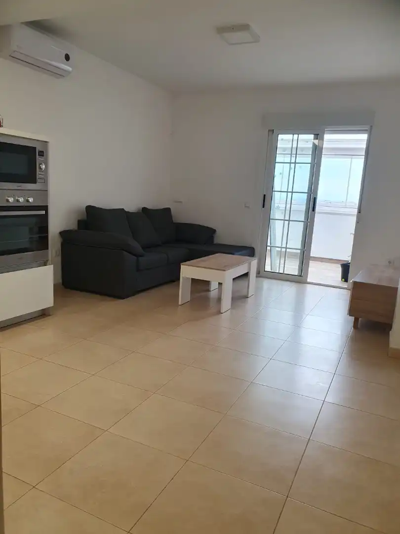 Sala d'estar de Pis de lloguer en Roquetas de Mar amb Aire condicionat, Calefacció i Terrassa