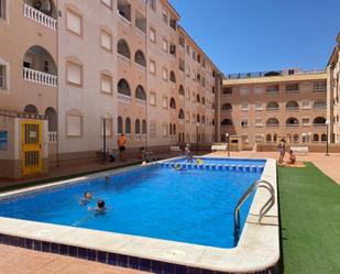 Swimming pool of Attic for sale in Torrevieja  with Air Conditioner, Heating and Terrace