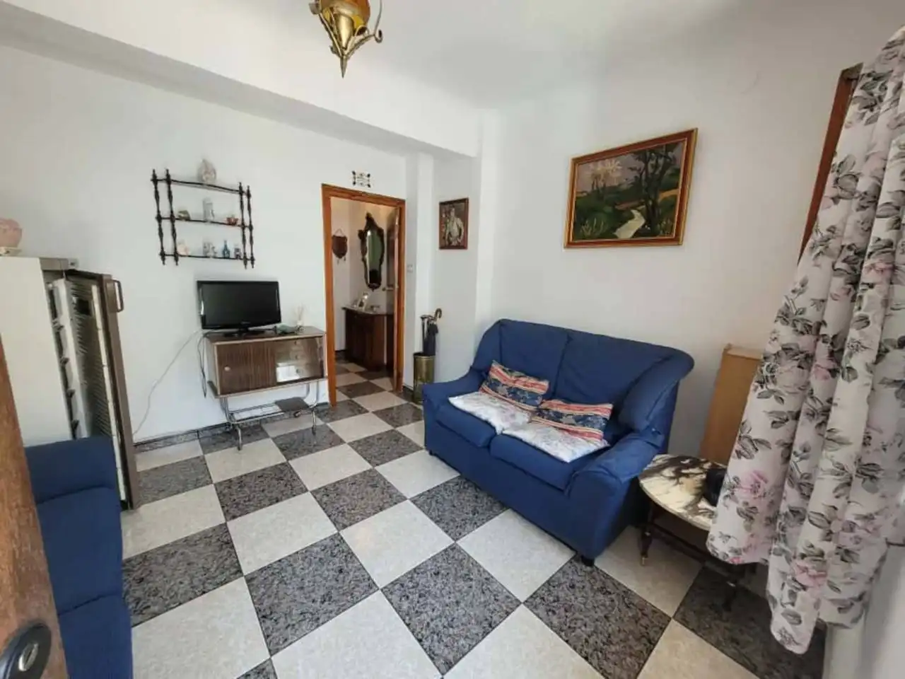 Sala d'estar de Casa o xalet en venda en Baza amb Terrassa