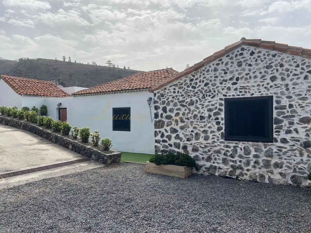 Vista exterior de Casa o xalet en venda en Guía de Isora amb Jardí privat i Terrassa