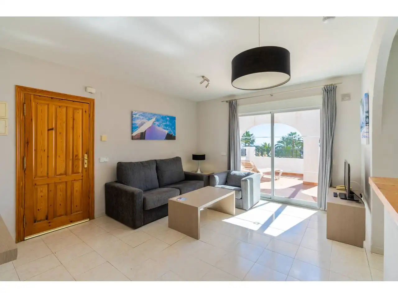 Wohnzimmer von Einfamilien-Reihenhaus zum Verkauf in Calpe / Calp mit Klimaanlage, Terrasse und Möbliert
