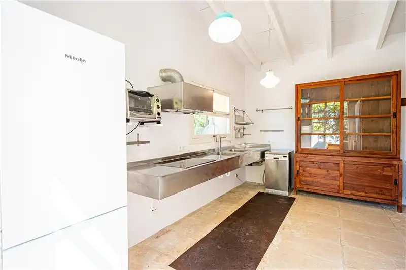 Cocina de Finca rústica de alquiler en Selva con Calefacción, Jardín privado y Terraza