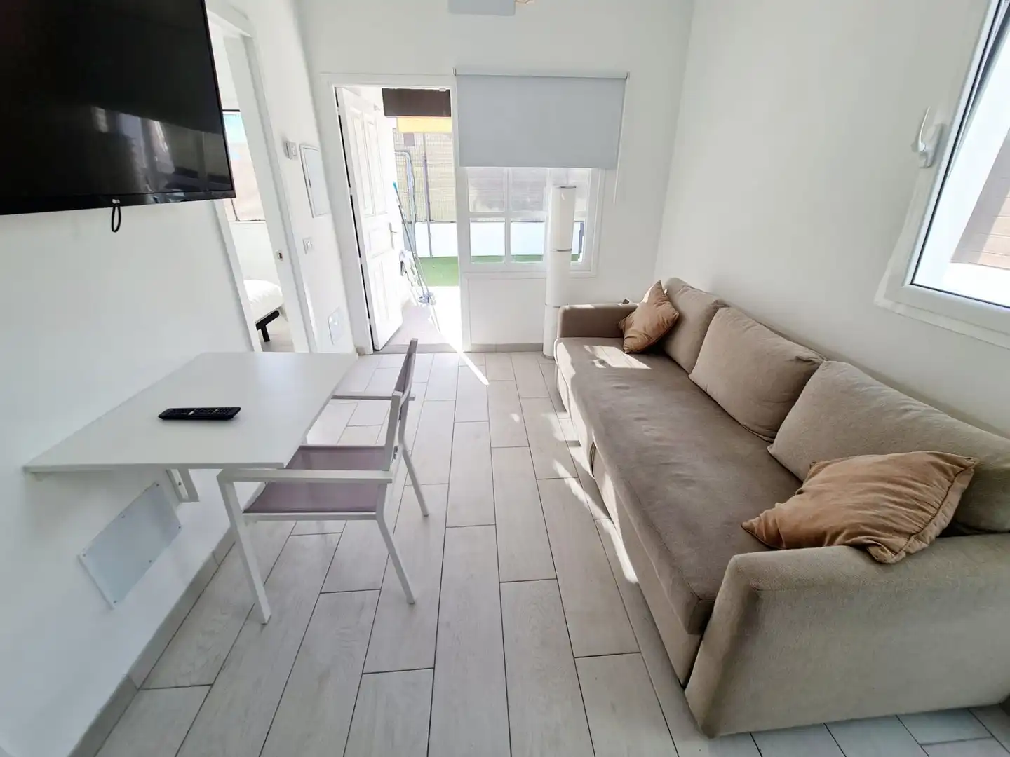 Sala d'estar de Casa o xalet de lloguer en San Bartolomé de Tirajana amb Aire condicionat, Jardí privat i Terrassa