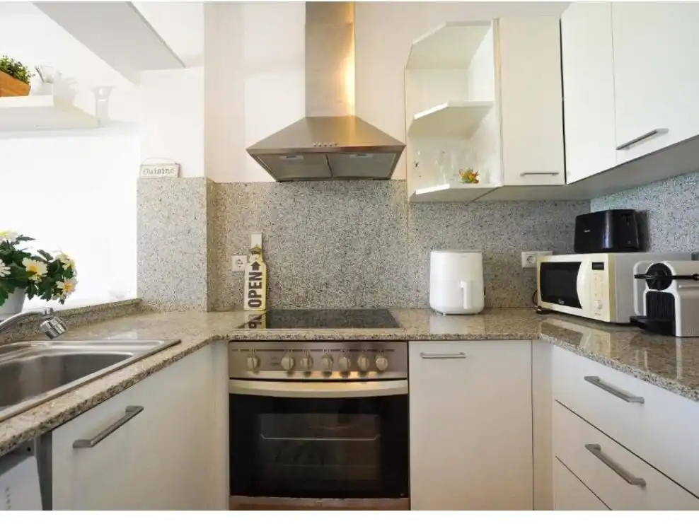 Cuina de Apartament en venda en Amposta amb Aire condicionat, Terrassa i Balcó