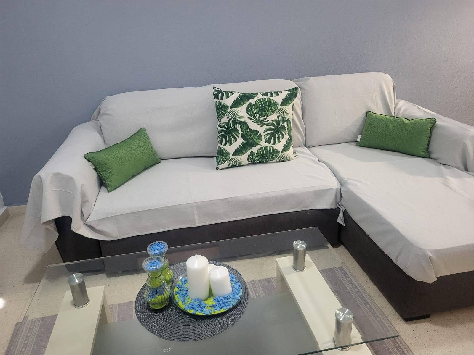 Sala d'estar de Apartament en venda en Benidorm amb Jardí privat, Terrassa i Piscina comunitària