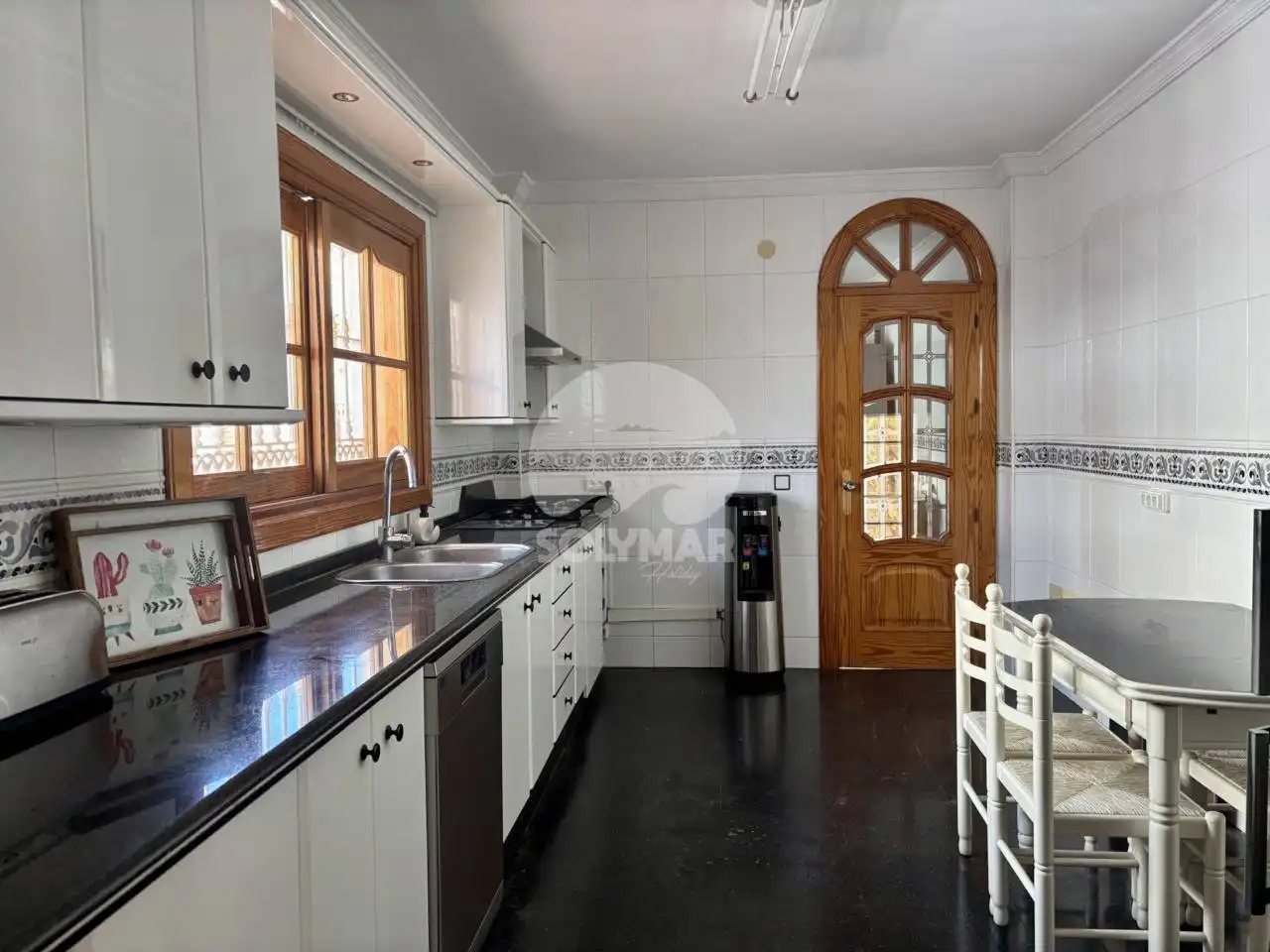 Cuina de Casa o xalet en venda en Vélez-Málaga amb Aire condicionat, Jardí privat i Terrassa