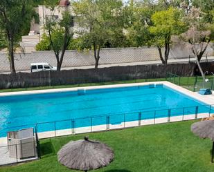 Swimming pool of Flat for sale in  Madrid Capital  with Air Conditioner, Heating and Storage room