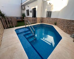 Swimming pool of House or chalet for sale in Sanlúcar la Mayor  with Air Conditioner, Private garden and Terrace