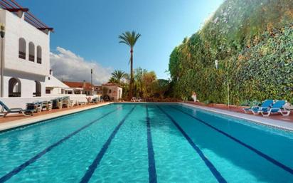 Swimming pool of Duplex for sale in Marbella