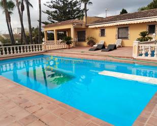 Piscina de Casa o xalet de lloguer en Oliva amb Jardí privat, Terrassa i Piscina