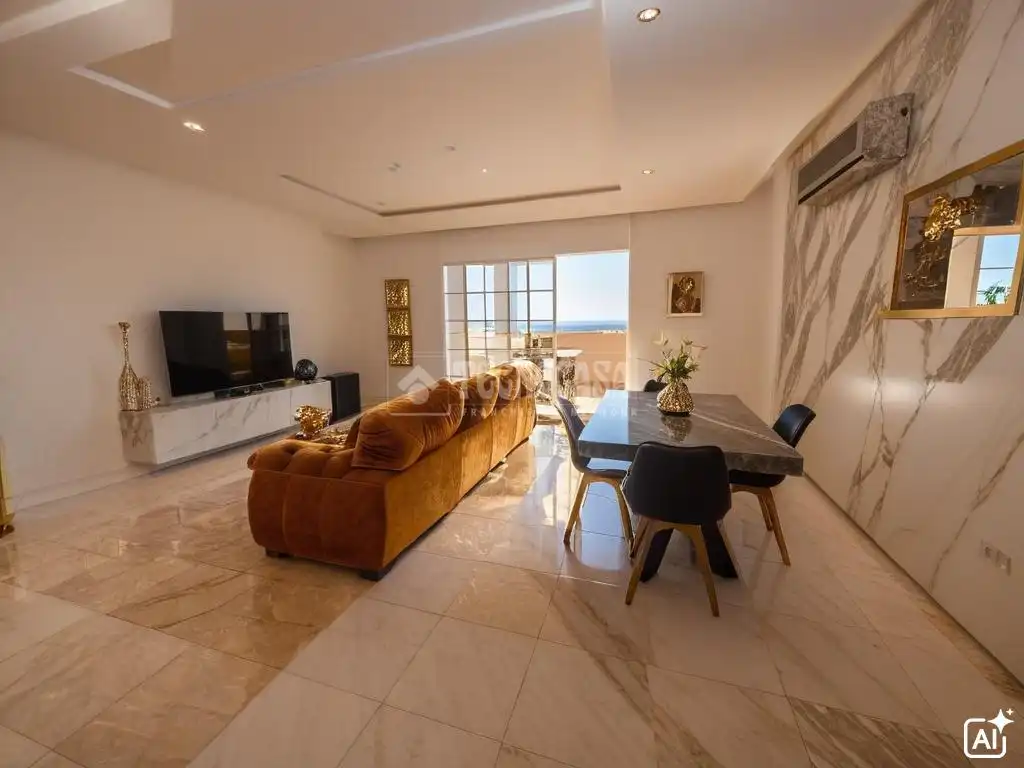 Sala de estar de Piso en venta en Manilva con Aire acondicionado, Terraza y Piscina comunitaria