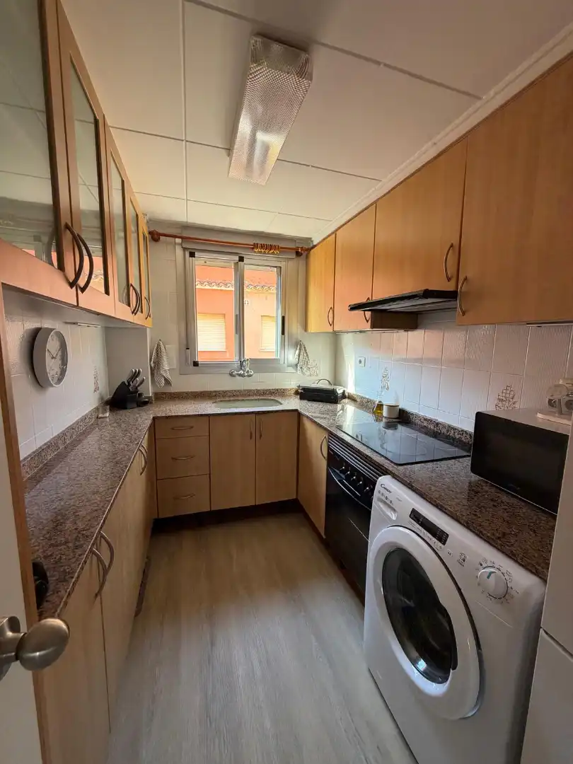 Cuina de Apartament de lloguer en Sueca amb Parquet, Terrassa i Moblat
