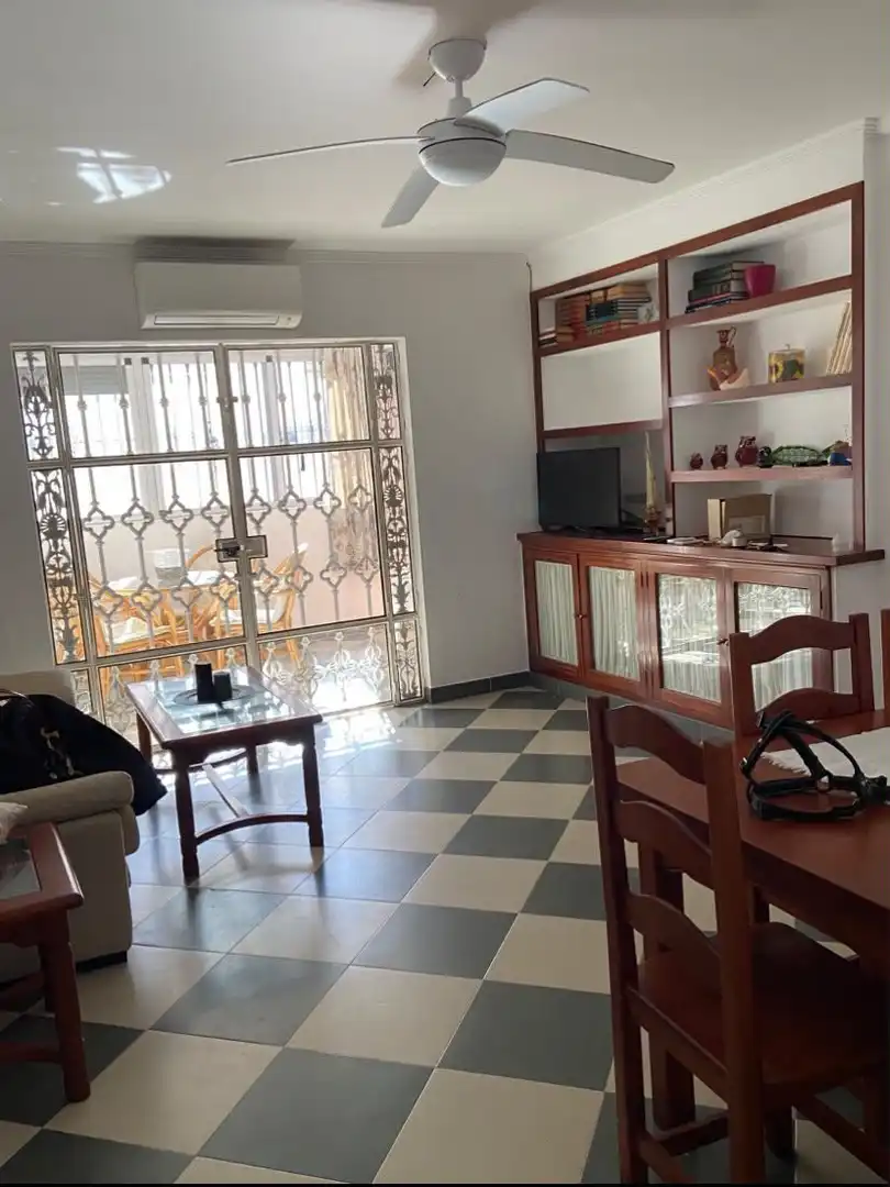Sala d'estar de Pis de lloguer en Punta Umbría amb Aire condicionat, Terrassa i Moblat