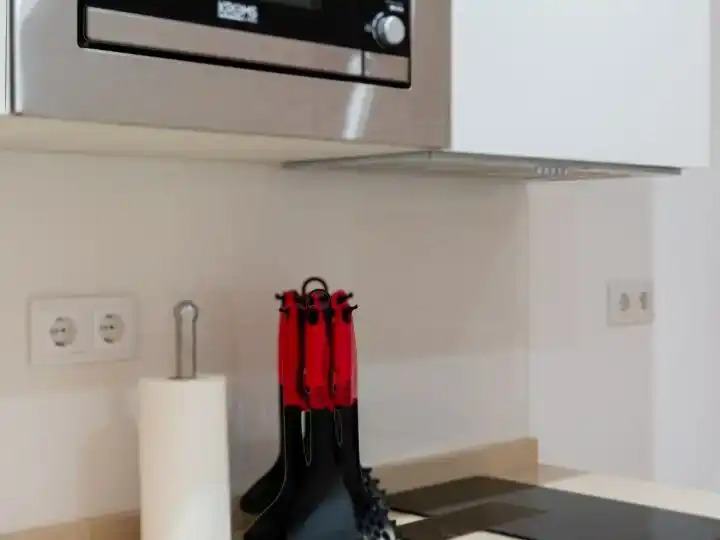 Cuina de Apartament de lloguer en  Sevilla Capital amb Aire condicionat