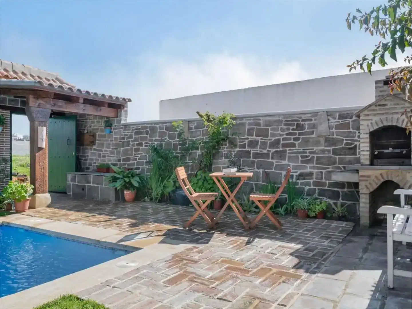 Terrassa de Finca rústica de lloguer en Conil de la Frontera amb Aire condicionat, Jardí privat i Piscina