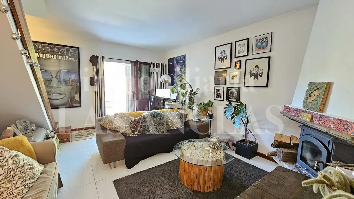 Sala de estar de Casa adosada en venta en Santa Eulària des Riu con Aire acondicionado, Jardín privado y Terraza