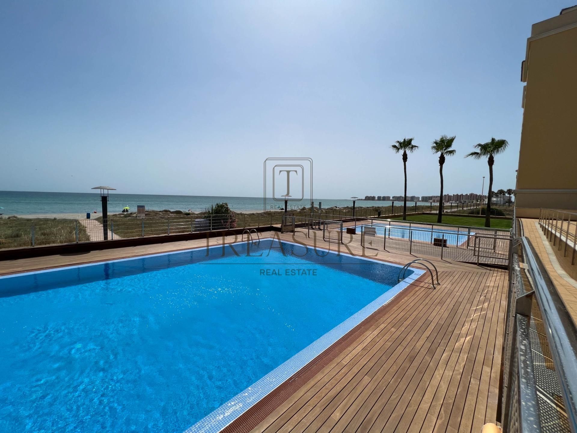 Swimming pool of Apartment for sale in La Manga del Mar Menor  with Air Conditioner, Private garden and Terrace