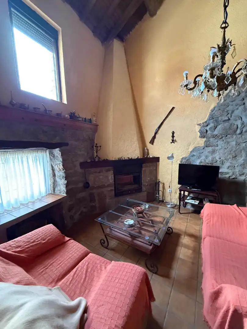 Sala de estar de Casa adosada en venta en La Torre con Calefacción, Jardín privado y Terraza