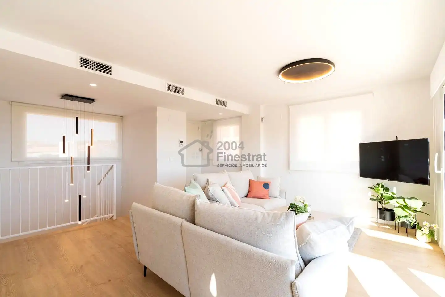 Sala de estar de Casa adosada en venta en La Nucia con Aire acondicionado, Jardín privado y Terraza