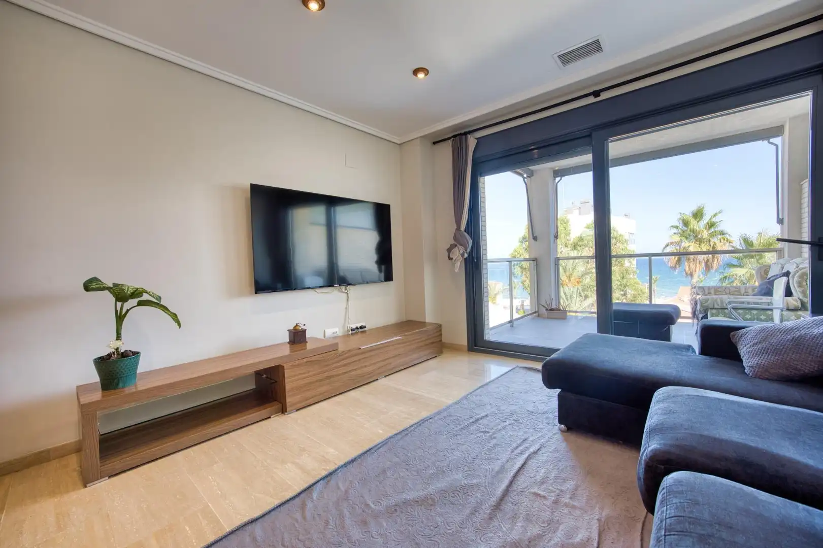 Sala d'estar de Pis en venda en El Campello amb Aire condicionat, Jardí privat i Terrassa