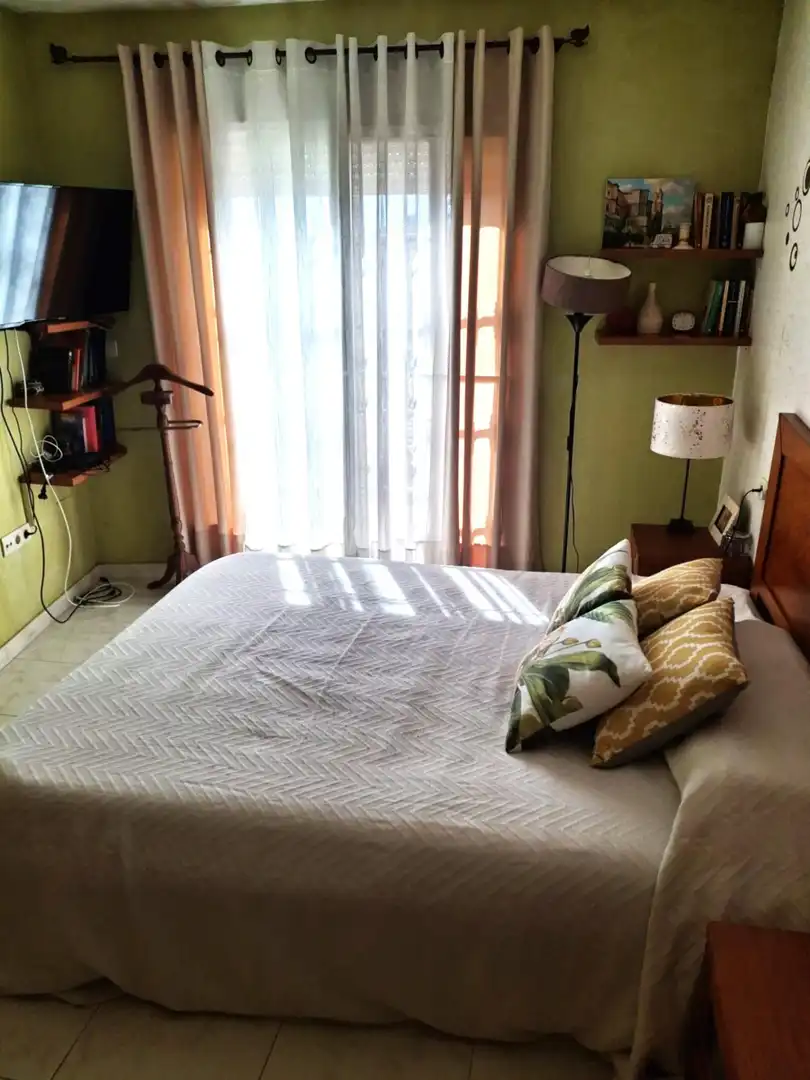 Habitación de Casa adosada en venta en Málaga con Aire acondicionado y Balcón