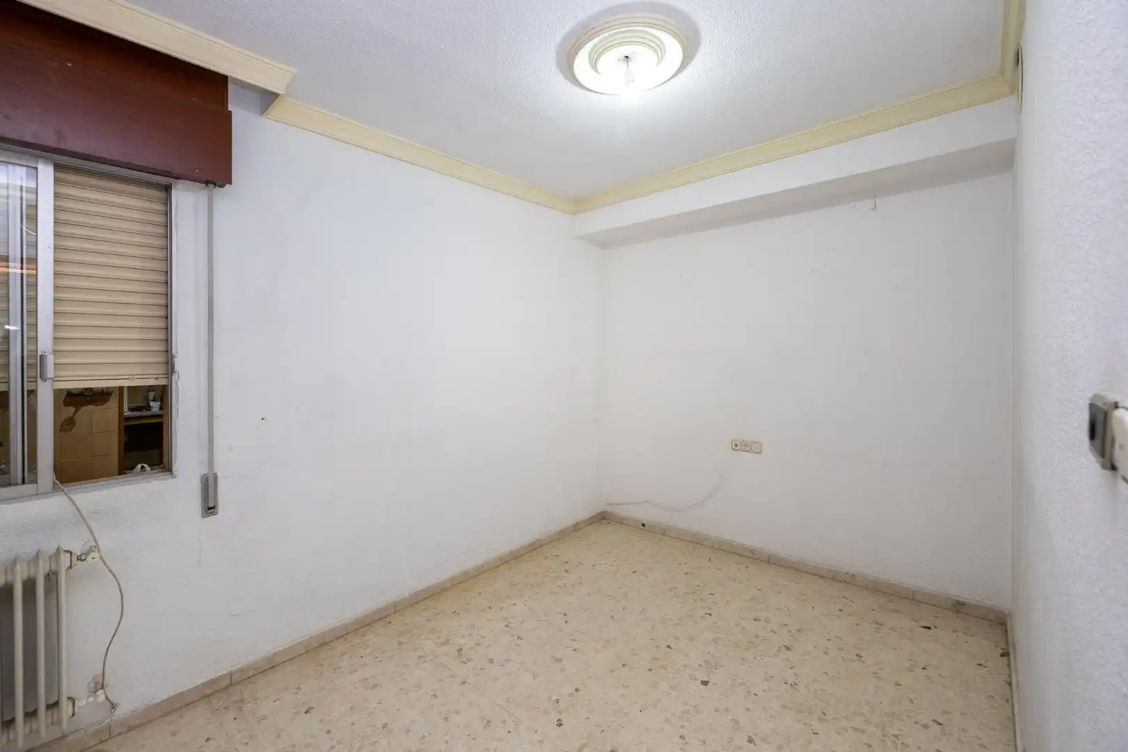 Dormitori de Pis en venda en Granada