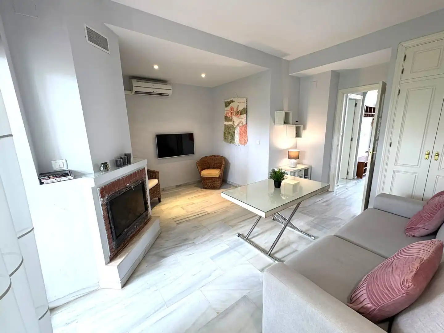 Sala de estar de Casa adosada en venta en El Portil con Calefacción, Terraza y Amueblado