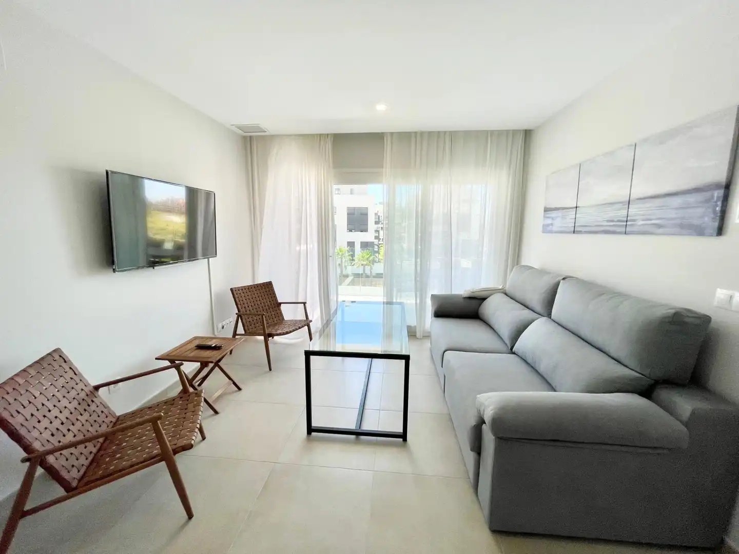 Sala d'estar de Apartament de lloguer en Ayamonte amb Aire condicionat, Calefacció i Jardí privat