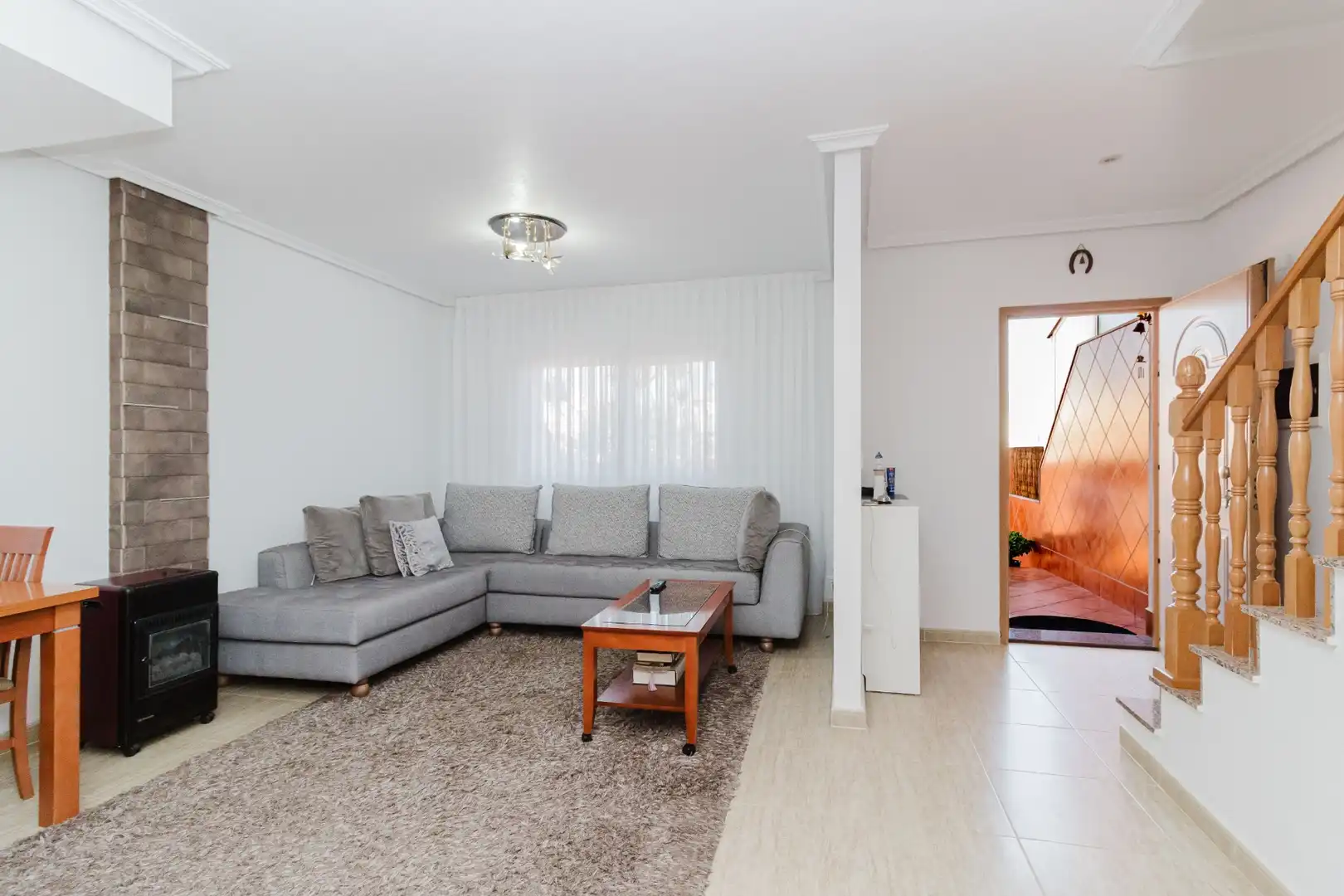Wohnzimmer von Einfamilien-Reihenhaus zum Verkauf in Los Alcázares mit Klimaanlage und Terrasse