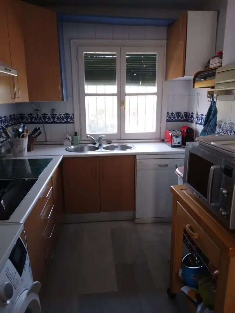 Cocina de Casa adosada en venta en Chiclana de la Frontera con Jardín privado y Piscina comunitaria