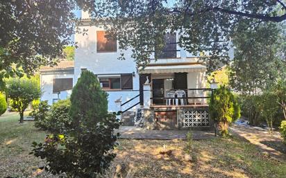Exterior view of House or chalet for sale in Riells i Viabrea  with Air Conditioner, Heating and Private garden