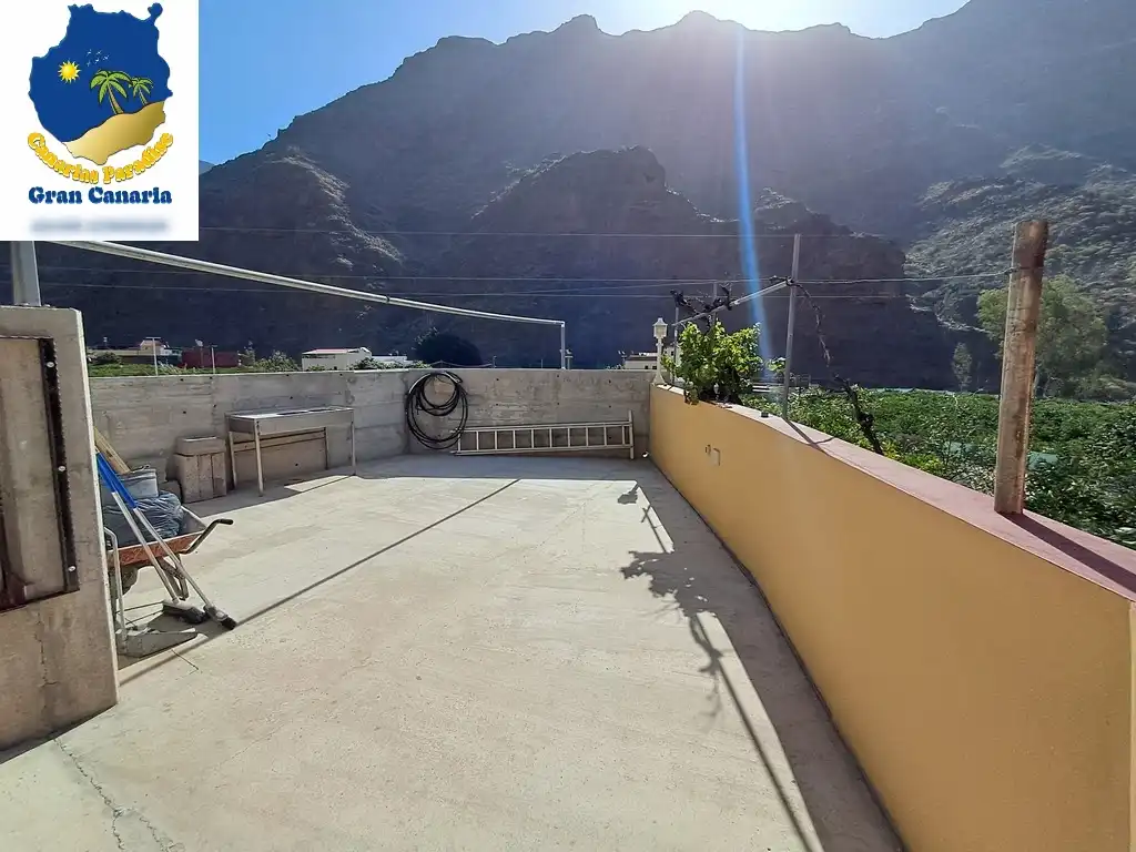 Außenansicht von Wohnung zum Verkauf in Mogán mit Privatgarten und Terrasse